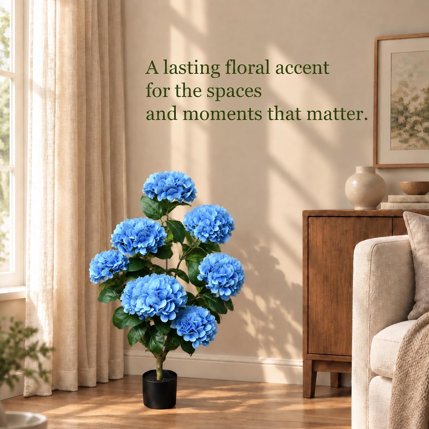 Blue 4 foot artificial hydrangea tree positioned in a sunlit room corner