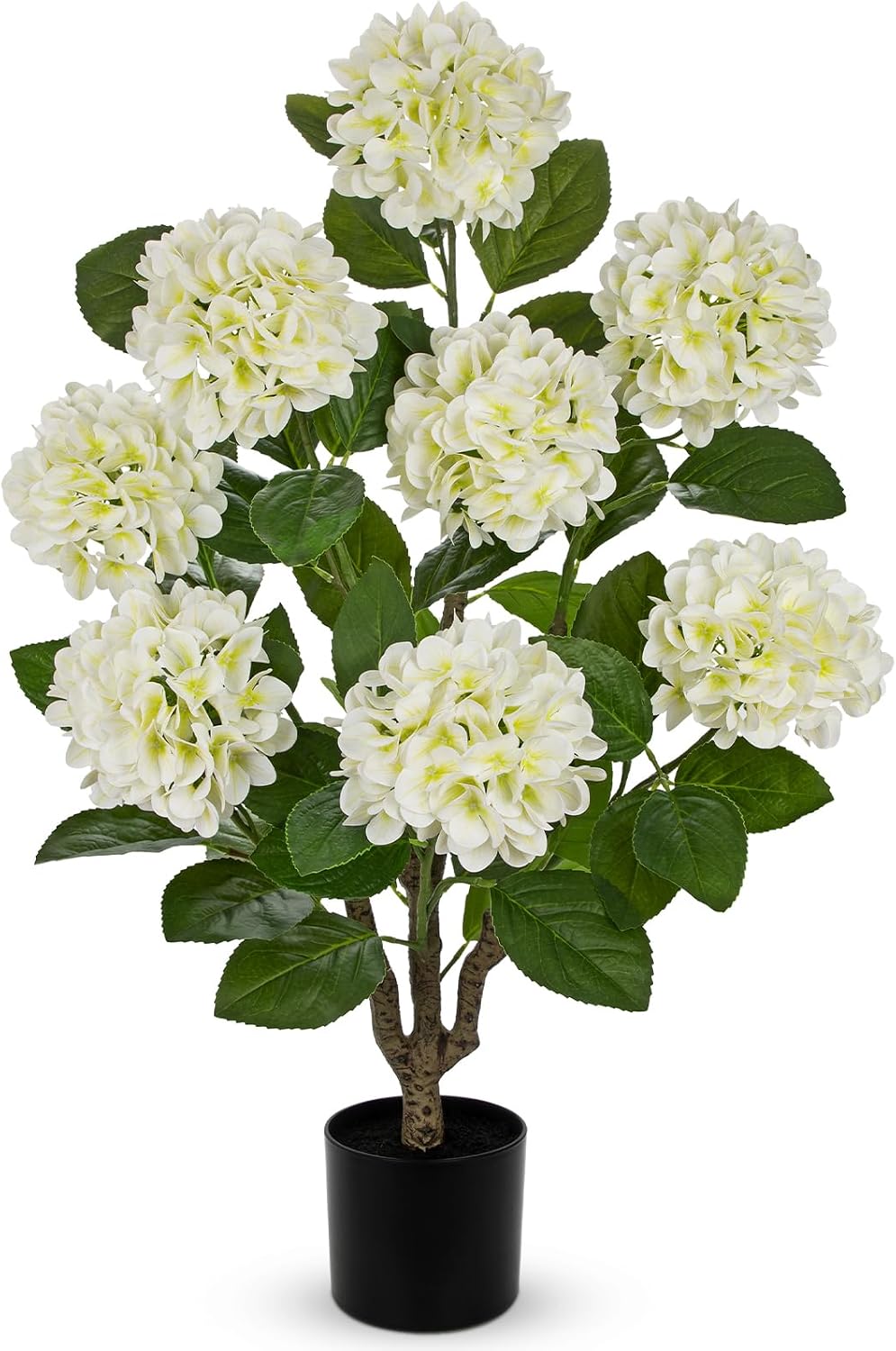 Artificial hydrangea tree beside a fireplace in a cozy living room