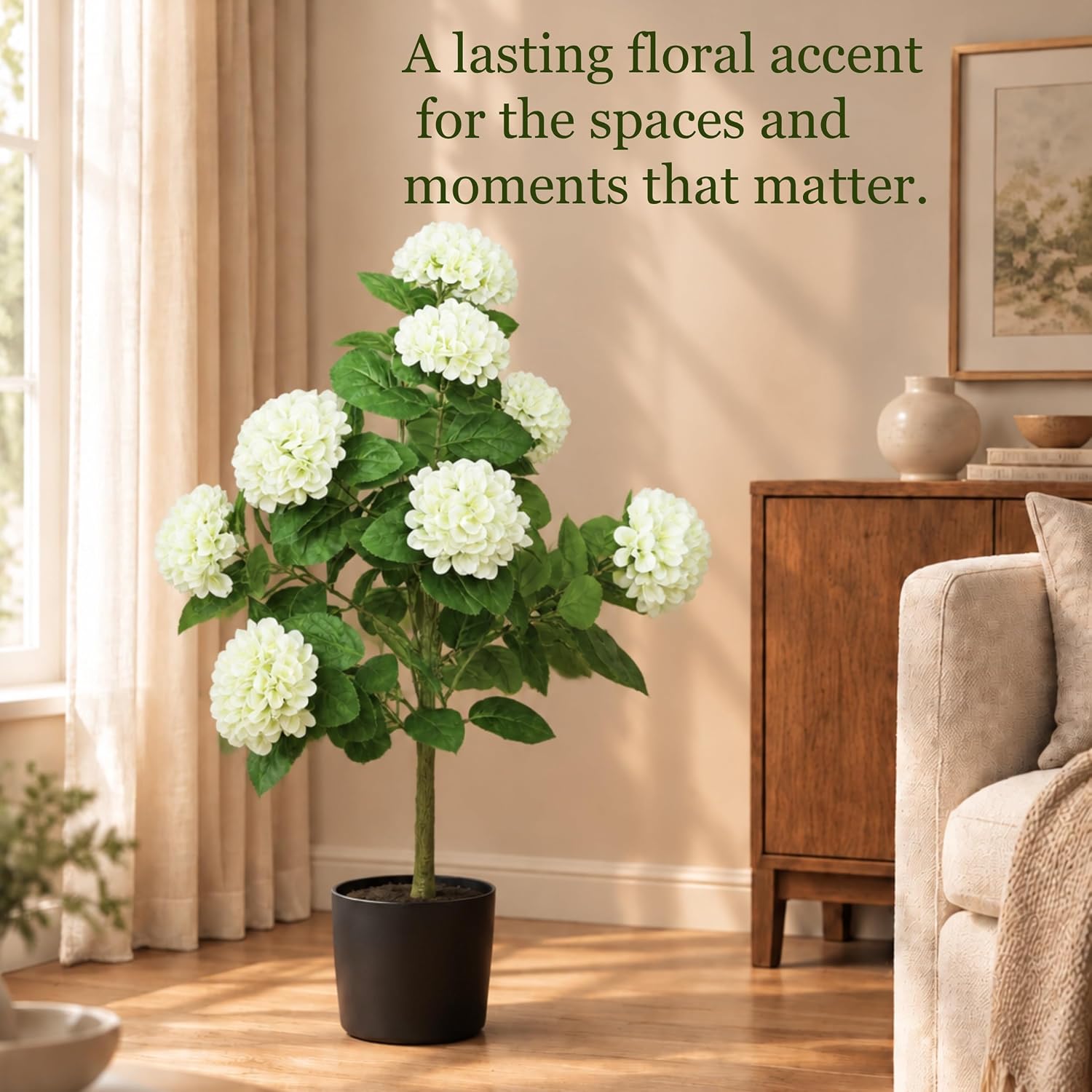 Artificial hydrangea tree displayed beside a fireplace at home